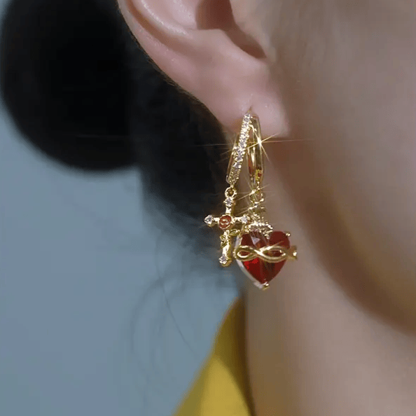 Valeria Montes Pendientes con Cruz y Corazón