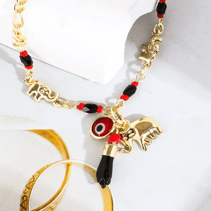 Valeria Montes Conjunto de Pulsera con Elefante y Ojo Turco de 14K