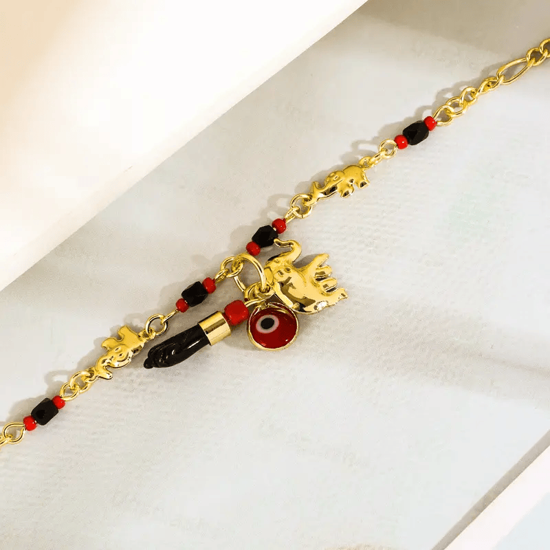 Valeria Montes Conjunto de Pulsera con Elefante y Ojo Turco de 14K
