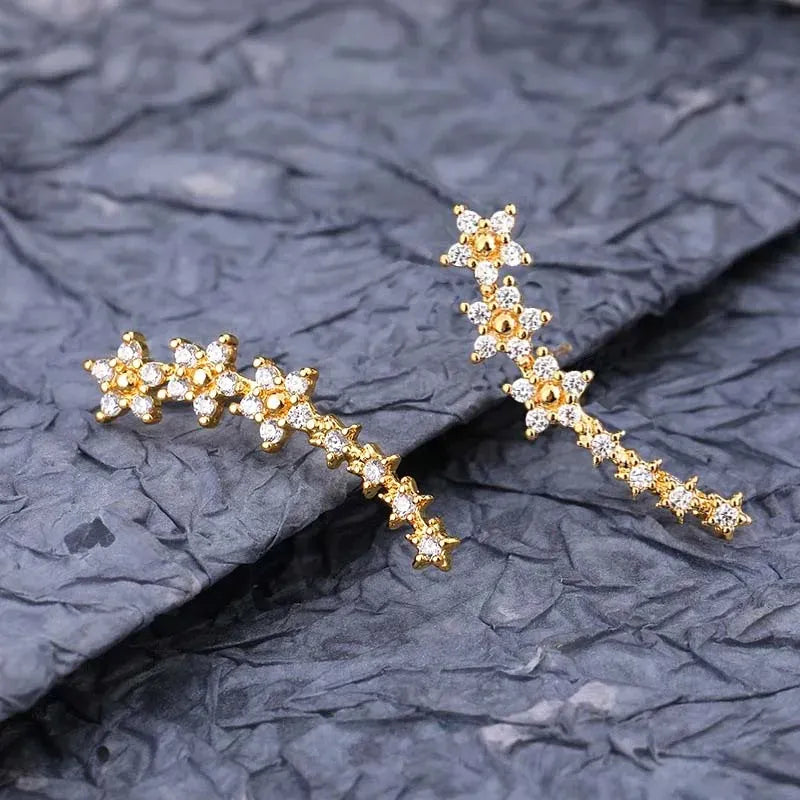Valeria Montes Gold Pendientes de tuerca con forma de estrella y flor de circón para mujer, aretes de escalada con Piercing de Metal Simple, accesorios de joyería, Color plateado
