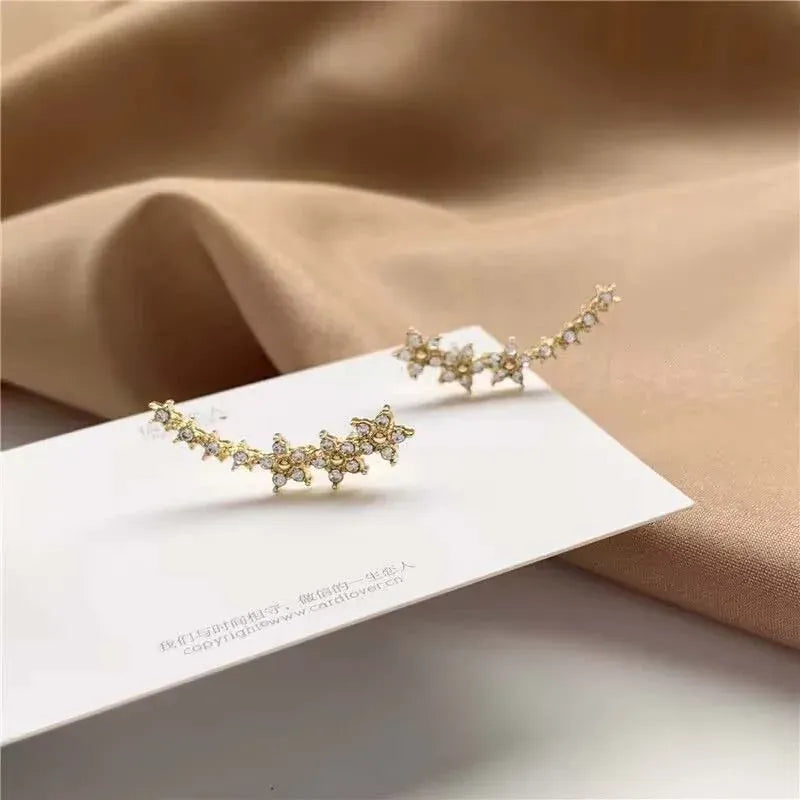 Valeria Montes Pendientes de tuerca con forma de estrella y flor de circón para mujer, aretes de escalada con Piercing de Metal Simple, accesorios de joyería, Color plateado