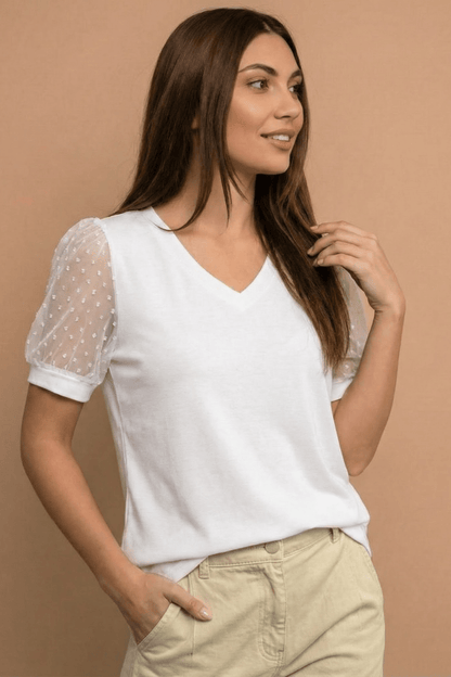 Valeria Montes TOP CON CUELLO ALTO EN V Y MANGAS TRANSPARENTES