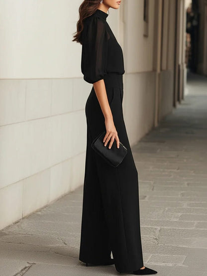 Valeria Montes Valentina | Conjunto de tres piezas en negro, compuesto por un top camisola transparente y unos pantalones de pierna ancha
